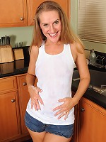 Hot blonde Sara J gives us a wet tshirt showing before showing all